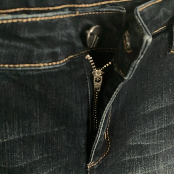 Tractr: Stretchy Skinny Jeans with red flannel covered holes- 30 - Picture 13 of 16